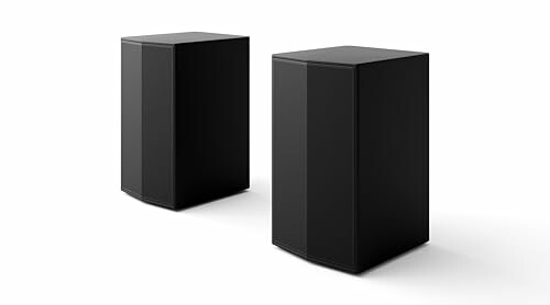 Pair of black speakers on white background.