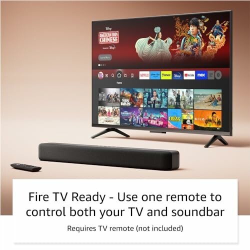 TV and soundbar with Fire TV interface and remote control reminder.