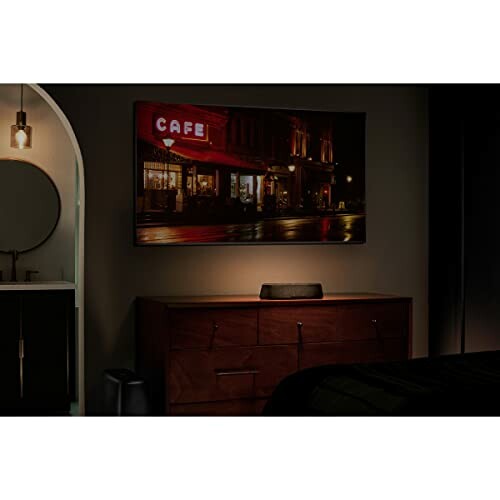 Modern bedroom with wall art and dresser